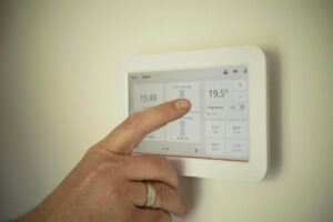 tablet, heating, man, pointing, manual, technology, person, male, computer, home, modern, system, energy, control, people, temperature, app, heating, heating, heating, heating, heating, temperature, temperature, temperature, temperature