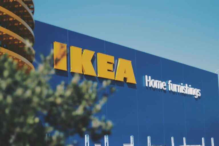 Beautiful image of a blue IKEA storefront with visible home furnishings sign.