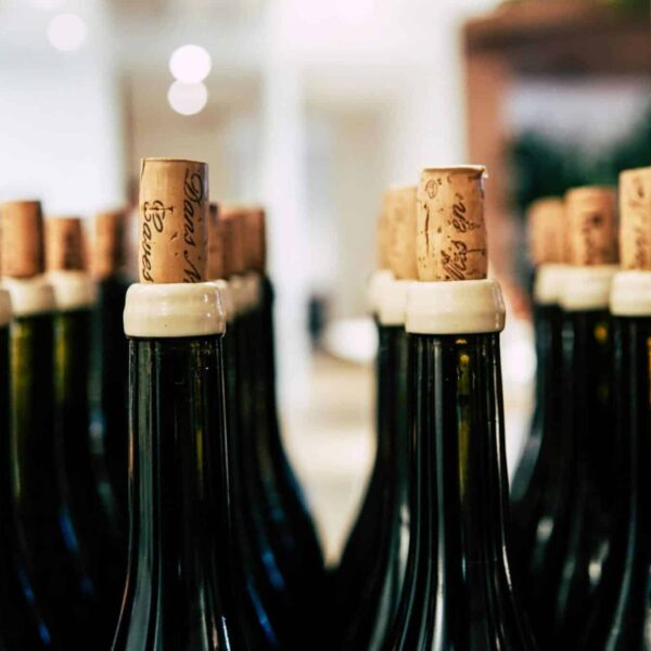 A detailed shot of wine bottles corked and ready for storage, perfect for beverage-themed content. Costco sparkling wine recall