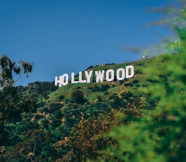 A scenic view of the famous Hollywood sign on a sunny day in Los Angeles.