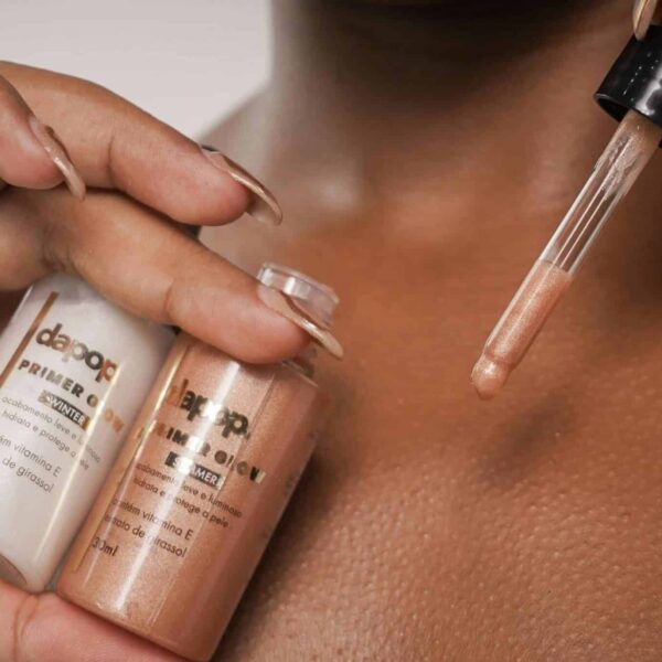 A detailed view of primer being applied to skin with a dropper. hydrating primers, mature skin