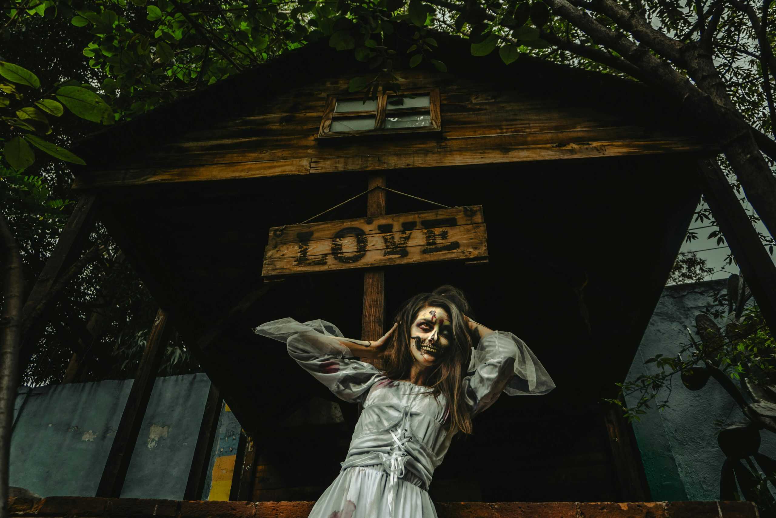 A person in a scary Halloween costume poses outdoors in Mexico City.