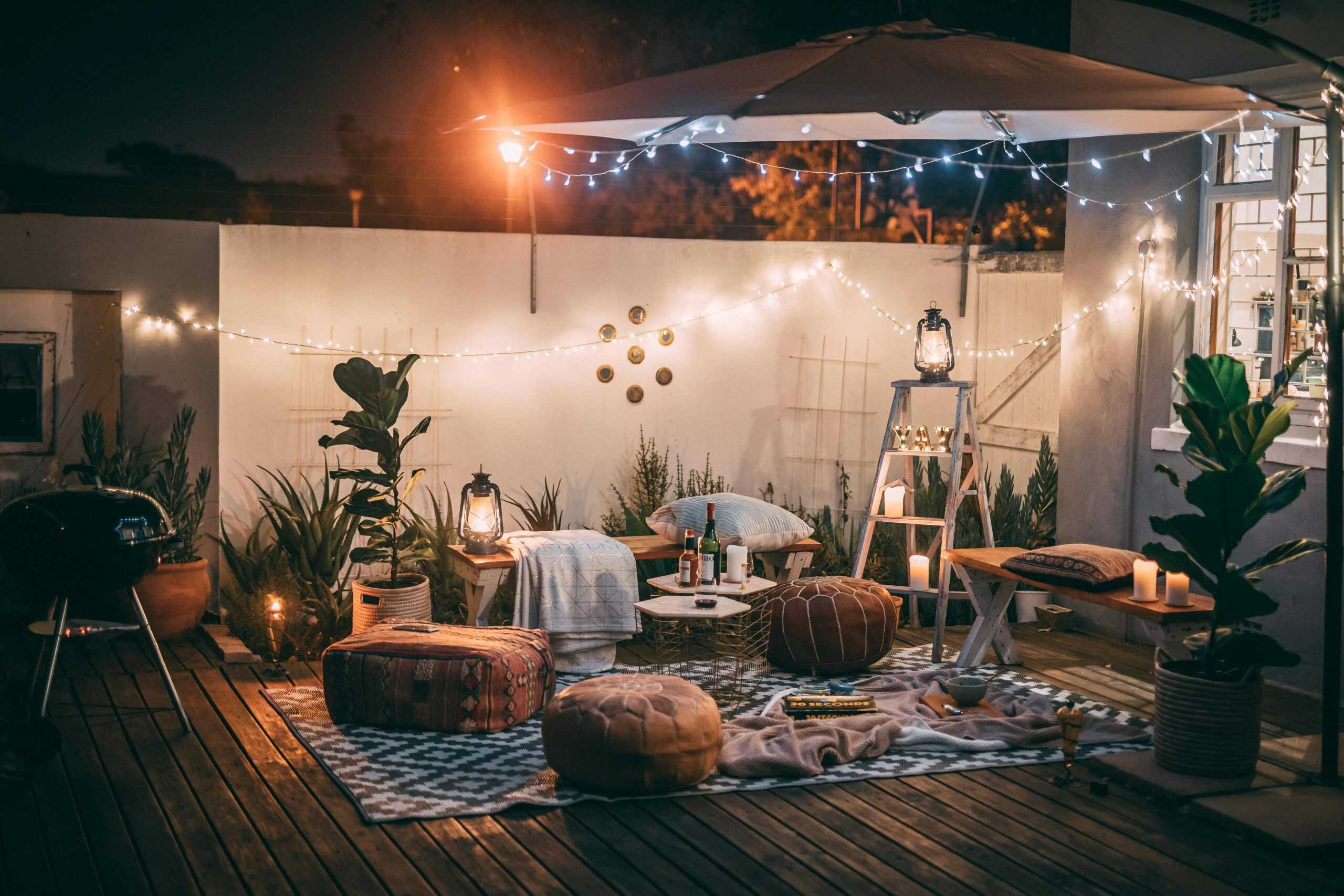 This photograph features an outdoor setting at home for romantic evening. Date night can take place in a cozy setting like this.