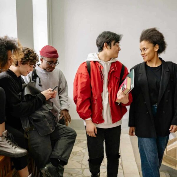 This is a photograph of students in a stairway. The beginning of the school year is an exciting time for high school fashion.