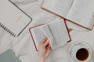 A cozy setup of Bible reading with a cup of coffee, evoking a peaceful morning routine, daily devotion