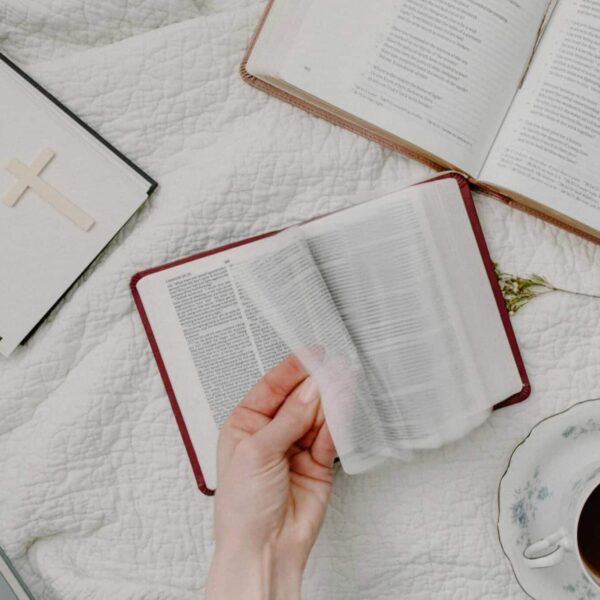 A cozy setup of Bible reading with a cup of coffee, evoking a peaceful morning routine, daily devotion