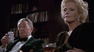 Maria Riva and Robert Mitchum, Mr. & Mrs. Rhinelander, Scrooged