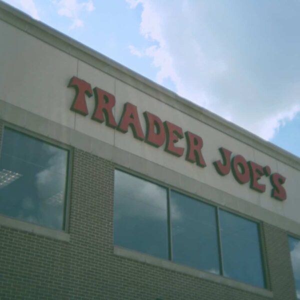 A trader joe's store with the sky in the background