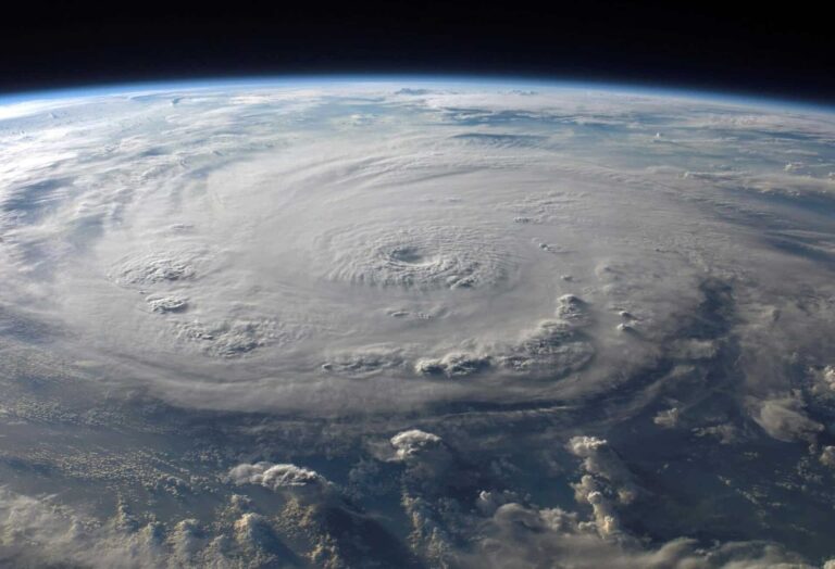 A stunning aerial view of Earth with a massive swirling hurricane, highlighting meteorological beauty, Jamaica, Hurricane Melissa
