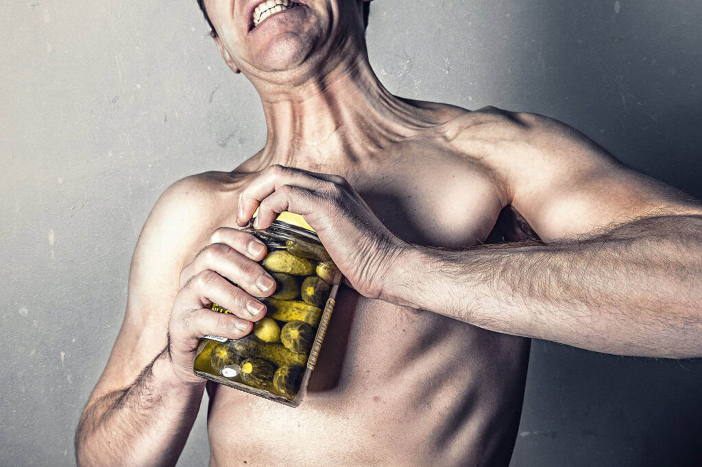 If you are stong enough to have a hangover are you strong enough to open the jar without spilling the pickle juice?