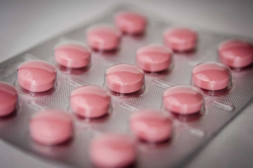 Pink tablets in a blister pack, emphasizing healthcare and medication concepts. GLP-1
