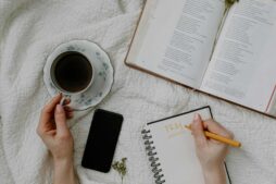 A serene morning meditation scene with coffee, Bible, and journal, daily devotion