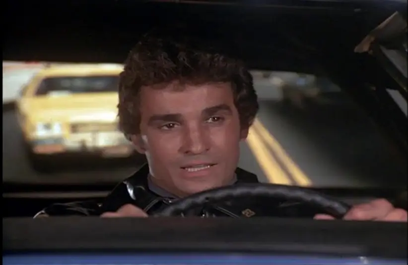 Screenshot of Michael Delano in McCloud (1970)