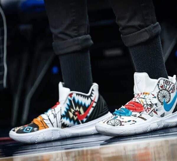This photograph features shoes worn by Seimone Augustus customized for Native American Heritage Night. The shoes are decorated with Native American motifs. Native American designers are being highlighted this year., Indigenous