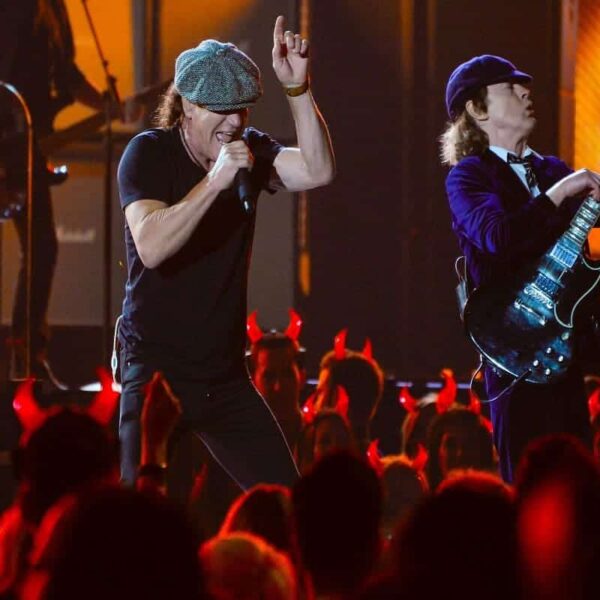 AC/DC lead vocalist Brian Johnson (left) and guitarist Angus Young performs "Rock or Bust" and "Highway to Hell" at the 57th annual Grammy Awards at the Nokia Theatre.