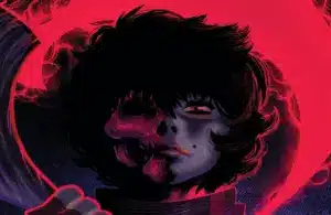 Stylized cover art from Boom Studios’ “Grim,” showing a figure with half a human face and half a glowing skull in red light.