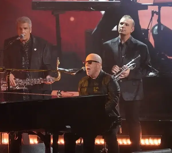 Today's epic earworm is from Billy Joel, pictured here performing at the 66th Annual Grammy Awards.