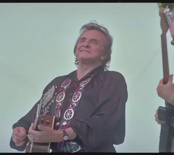 Today's epic earworm is from Johnny Cash, pictured here performing at Fan Fair held at the State Fairgrounds in Nashville, Tennessee in 1993.