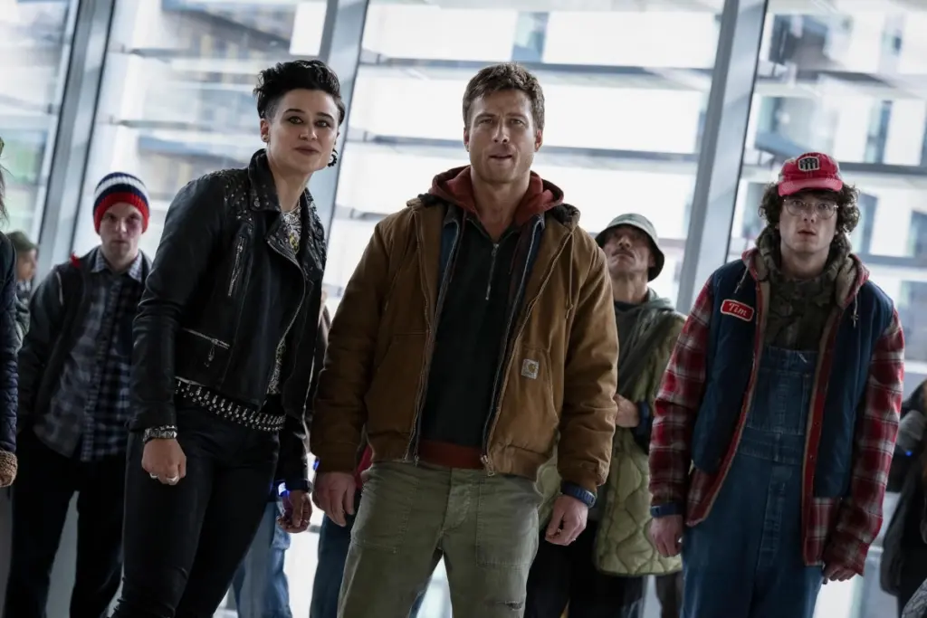 Martin Herlihy, Glen Powell, and Katy O'Brian in The Running Man (2025)