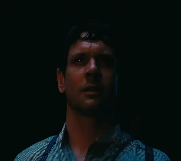 Jack O'Connell in Sinners (2025) with red glowing eyes