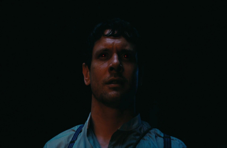 Jack O'Connell in Sinners (2025) with red glowing eyes