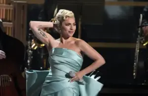 Apr 3, 2022; Las Vegas, NV, USA; Lady Gaga performs during the 64th Annual Grammy Awards at the MGM Grand Garden Arena in Las Vegas. Mandatory Credit: Robert Hanashiro-USA TODAY