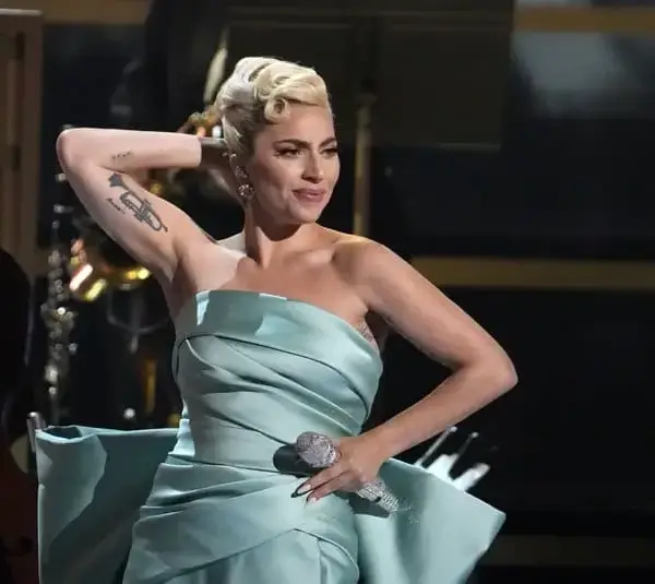 Apr 3, 2022; Las Vegas, NV, USA; Lady Gaga performs during the 64th Annual Grammy Awards at the MGM Grand Garden Arena in Las Vegas. Mandatory Credit: Robert Hanashiro-USA TODAY