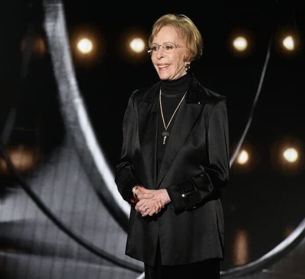 Carol Burnett presents the award for outstanding lead actress in a comedy series during the 75th Emmy Awards at the Peacock Theater in Los Angeles