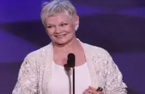 3/21/99 -- Los Angeles, Ca. -- Judi Dench accepts the award for best supporting actress at the 71st Annual Academy Awards. ORG XMIT: DENCH AK006. © ROBERT HANASHIRO / USA TODAY NETWORK