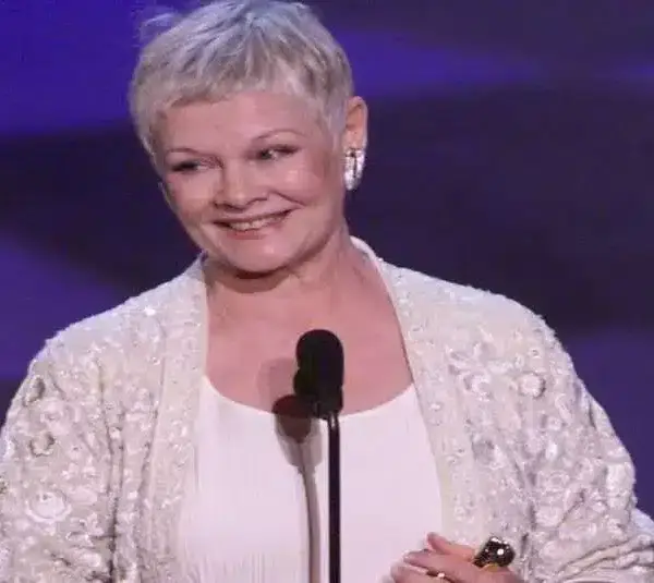 3/21/99 -- Los Angeles, Ca. -- Judi Dench accepts the award for best supporting actress at the 71st Annual Academy Awards. ORG XMIT: DENCH AK006. © ROBERT HANASHIRO / USA TODAY NETWORK