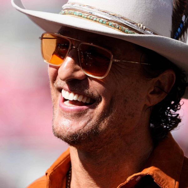 Matthew McConaughey stands on the field prior to the NCAA football game between the Ohio State Buckeyes and the Texas Longhorns at Ohio Stadium on Aug. 30, 2025.