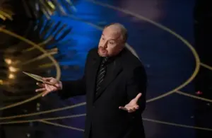 Feb 28, 2016; Hollywood, CA, USA; Louis C.K. presents the Oscar for best documentary short subject during the 88th annual Academy Awards at the Dolby Theatre. Mandatory Credit: Robert Deutsch-USA TODAY NETWORK