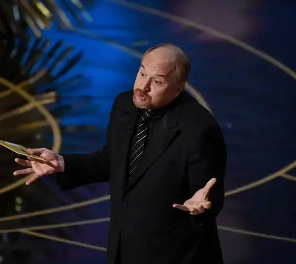 Feb 28, 2016; Hollywood, CA, USA; Louis C.K. presents the Oscar for best documentary short subject during the 88th annual Academy Awards at the Dolby Theatre. Mandatory Credit: Robert Deutsch-USA TODAY NETWORK