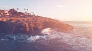 This is a photograph of seaside cliffs in San Diego. California can be a location for a crowd-free Thanksgiving.