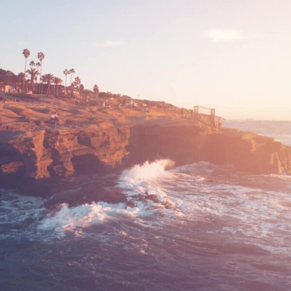 This is a photograph of seaside cliffs in San Diego. California can be a location for a crowd-free Thanksgiving.