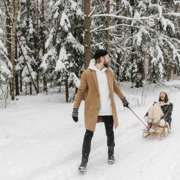 A playful couple with different holiday styles enjoys a peaceful time without relationship conflict by establishing new traditions.