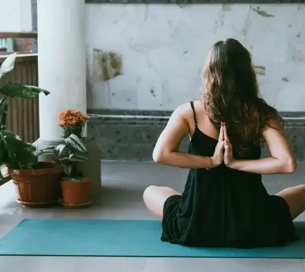 woman doing yoga, home yoga