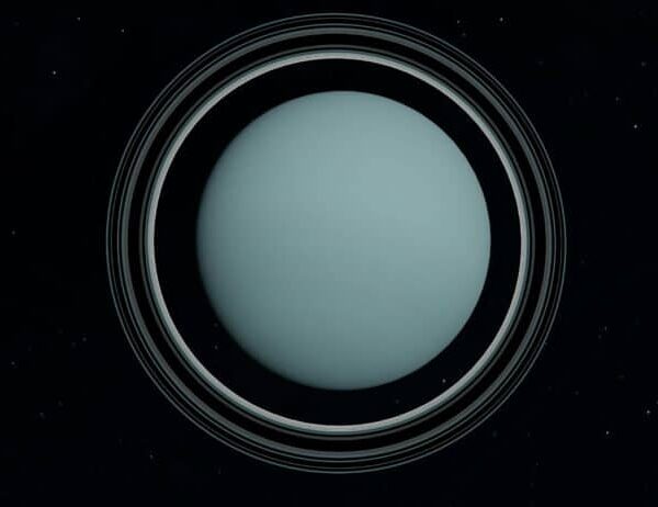 Captivating view of Uranus showcasing its distinct rings and celestial surroundings. Uranus retrograde