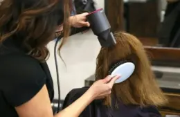 person getting their hair done at a salon, Anna Duggar