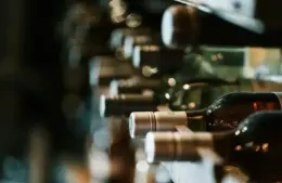 Bottles of wine in a wine rack. Thanksgiving dinner. Wine pairings
