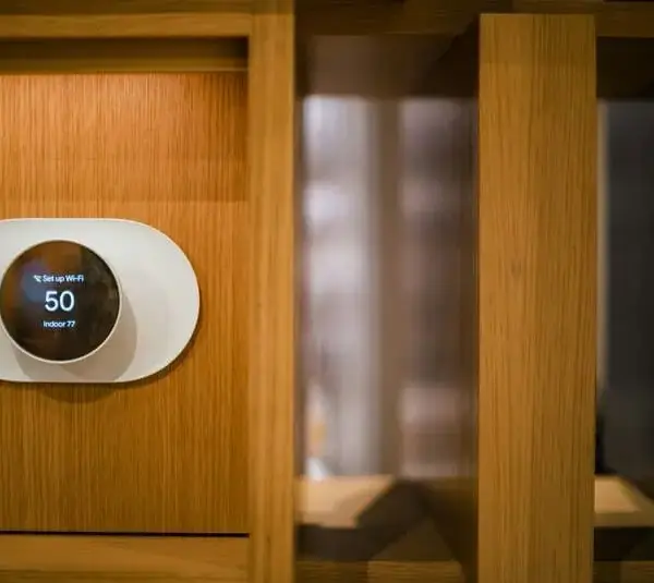 Thermostat on paneling. save on winter utility bills