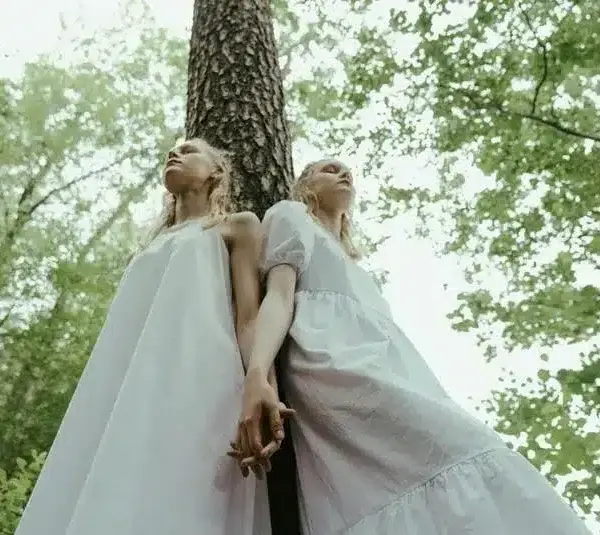 The twins represent Gemini in the energy of the woods.