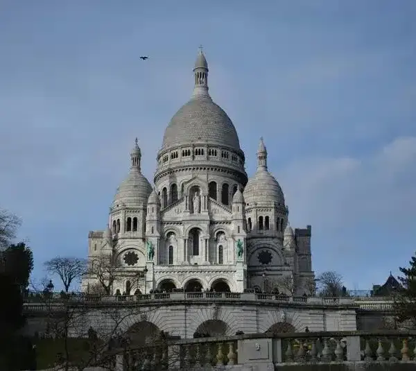 SacreCoeur Basilica in Paris on a clear day. Saint Theophane Vernard was a French Missionary.