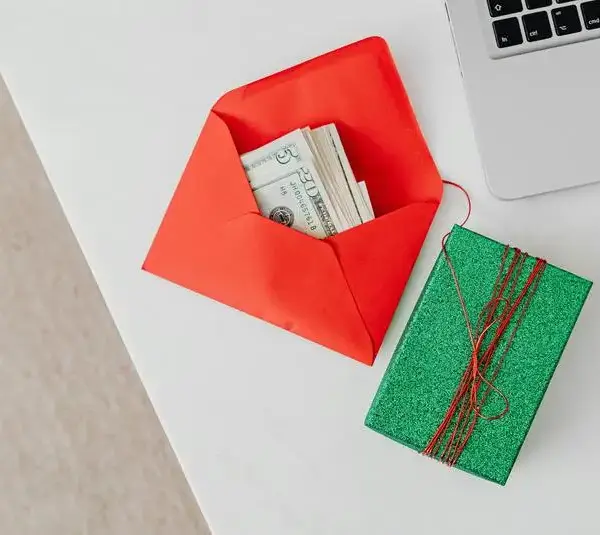 holiday budget, money in an envelope, holiday theme, budgeting for the holidays