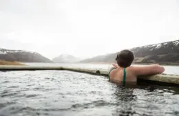 Hot springs being enjoyed during winter travel.