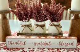 jars of flowers with a sign that says: thankful, grateful, blessed / gratitude, faith