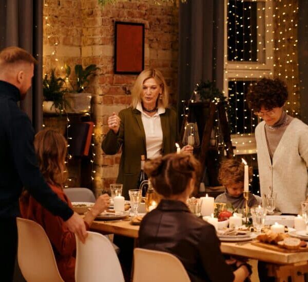 This is a photograph of a family celebrating a holiday. Holiday plans can be a topic of conversation for couples.