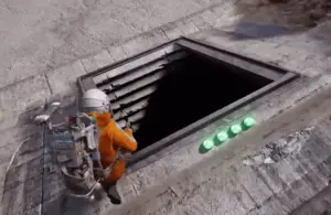 Screenshot of ARC Raiders. Raider in a orange jumpsuit with space helmet and large backpack trying to enter a rolled up bunker door