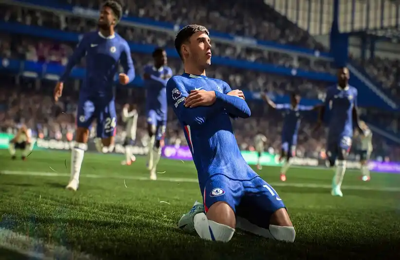 EA Sports FC 26 player in blue uniform celebrating, Best Sports Games 2026