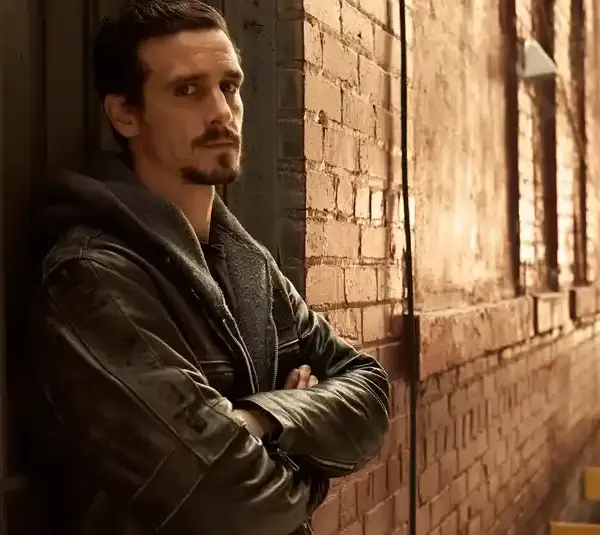 James Ransone standing against a wall in "Low Winter Sun" (2013)